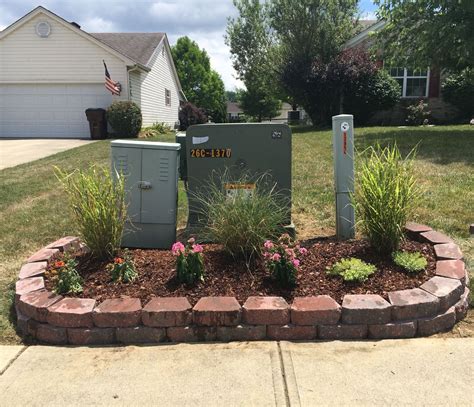 how to hide an electrical box in yard|how to hide utility boxes.